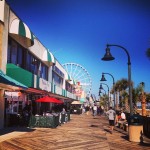 Visitors enjoy the weather in Myrtle Beach and take a stroll on the Boardwalk