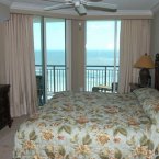 Master bedroom with oceanfront balcony